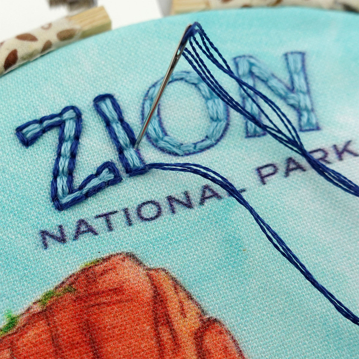 Zion National Park Embroidery Kit  close up of Zion embroidered lettering with backstitch