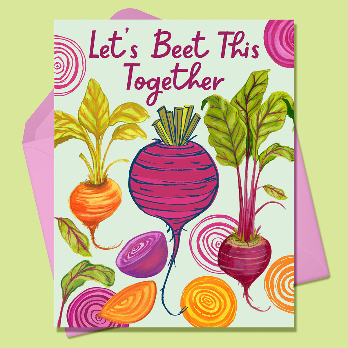 Paper Greeting card with the image of brightly colored beets in orange, pink, purple, on a mint background. Text says Let's Beet This Together. With a pink envelope. On a lime green background.